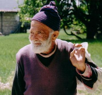 Turkish villagers - Fegmi Dede with his load of goods for sale