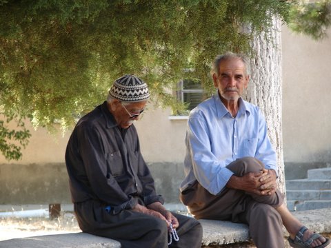 village men awaiting the call to prayer=
